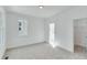 Bright bedroom with neutral carpet and large windows at 1284 Six Sisters St, Dacula, GA 30019