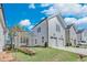 Two story home with two car garage and stone wall at 1284 Six Sisters St, Dacula, GA 30019