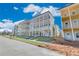 Row of two-story homes with balconies and white columns at 1284 Six Sisters St, Dacula, GA 30019