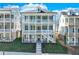 Two-story home with wraparound porch and brick facade at 1284 Six Sisters St, Dacula, GA 30019