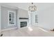 Living room with fireplace and hardwood floors at 1284 Six Sisters St, Dacula, GA 30019