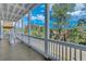 Spacious porch with white columns and wooded views at 1284 Six Sisters St, Dacula, GA 30019