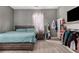Main bedroom with a large bed and gray walls at 4115 Hicks Rd, Austell, GA 30106