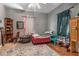 Cozy bedroom with wood flooring and window coverings at 4115 Hicks Rd, Austell, GA 30106