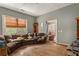 Living room with a sectional sofa and wood floors at 4115 Hicks Rd, Austell, GA 30106