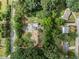 Aerial view showing property, trees, and neighboring houses at 4115 Hicks Rd, Austell, GA 30106