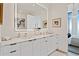 Modern bathroom with double vanity, sleek cabinets, and a large mirror at 788 W Marietta Nw St # 1803, Atlanta, GA 30318