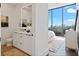 Modern bathroom with double vanity and bedroom view at 788 W Marietta Nw St # 1803, Atlanta, GA 30318