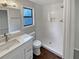 Updated bathroom with white subway tile shower and vanity at 3002 Fetlock Sw Dr, Marietta, GA 30064