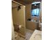 Basement bathroom with toilet, sink, and shower at 1005 Ashby Ter, Atlanta, GA 30314