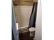 Clean bathroom with vinyl flooring, shower/tub combo and grey shower curtain at 1005 Ashby Ter, Atlanta, GA 30314