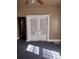 Living room featuring French doors and ceiling fan at 1005 Ashby Ter, Atlanta, GA 30314