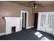 Living room with fireplace and French doors at 1005 Ashby Ter, Atlanta, GA 30314