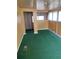 Bright bonus room with green carpet and an interior door at 1005 Ashby Ter, Atlanta, GA 30314