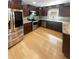 Modern kitchen features stainless steel appliances and granite countertops at 1752 Wilsons Crossing Dr, Decatur, GA 30033