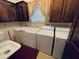 Laundry room with washer, dryer, and utility sink at 3355 Smithtown Rd, Suwanee, GA 30024