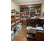 Spacious office with built-in bookshelves and hardwood floors at 3355 Smithtown Rd, Suwanee, GA 30024