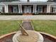 Brick house with a large front porch and columns at 3355 Smithtown Rd, Suwanee, GA 30024