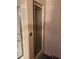 Small shower stall with glass door and neutral tile at 3355 Smithtown Rd, Suwanee, GA 30024