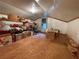 Large attic storage space with plywood flooring and shelving at 3355 Smithtown Rd, Suwanee, GA 30024