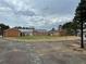 Large backyard with brick home in the background at 3355 Smithtown Rd, Suwanee, GA 30024