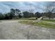 Spacious front yard with circular driveway and landscaping at 3355 Smithtown Rd, Suwanee, GA 30024