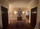 Spacious hallway with hardwood floors and period details at 3355 Smithtown Rd, Suwanee, GA 30024