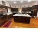 Spacious kitchen with an island, stainless steel appliances, and ample cabinetry at 3355 Smithtown Rd, Suwanee, GA 30024