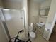 Small bathroom with shower, toilet, and sink at 3355 Smithtown Rd, Suwanee, GA 30024