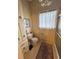 Small bathroom with toilet, bathtub, and built-in cabinet at 3355 Smithtown Rd, Suwanee, GA 30024