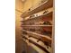 Built-in shelves filled with antique woodworking tools at 3355 Smithtown Rd, Suwanee, GA 30024