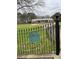 Ornate iron gate and entryway to the house at 3355 Smithtown Rd, Suwanee, GA 30024