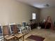 Common area with rocking chairs, a sofa, and a table at 3355 Smithtown Rd, Suwanee, GA 30024
