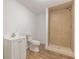 Simple bathroom with toilet, sink, and shower at 1410 Eastland Se Rd, Atlanta, GA 30316