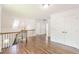 Upper hallway with hardwood floors and double closets at 1410 Eastland Se Rd, Atlanta, GA 30316