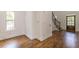 Hardwood floor entryway with an interior door and a staircase at 1410 Eastland Se Rd, Atlanta, GA 30316