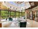 Bright sunroom with ample seating and large windows at 56 Mount Paran Rd, Atlanta, GA 30327