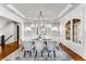Bright dining room with hardwood floors and a large chandelier at 56 Mount Paran Rd, Atlanta, GA 30327