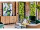 Sunroom features a statement art piece and comfortable seating at 56 Mount Paran Rd, Atlanta, GA 30327