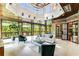 Bright sunroom with ample seating and large windows at 56 Mount Paran Rd, Atlanta, GA 30327
