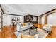 Basement with wet bar, seating area, and hardwood floors at 56 Mount Paran Rd, Atlanta, GA 30327