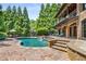 Expansive pool area with flagstone patio and plenty of lounge chairs at 56 Mount Paran Rd, Atlanta, GA 30327