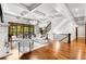 Spacious living room with hardwood floors, coffered ceilings and large windows at 56 Mount Paran Rd, Atlanta, GA 30327