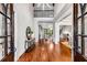 Two-story foyer with hardwood floors and elegant architectural details at 56 Mount Paran Rd, Atlanta, GA 30327
