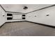 Basement home theater with projector, screen, and recessed lighting at 56 Mount Paran Rd, Atlanta, GA 30327