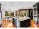 Gourmet kitchen with large island, stainless steel appliances, and custom cabinetry at 56 Mount Paran Rd, Atlanta, GA 30327