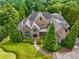 Luxury home situated on a spacious lot with mature trees at 56 Mount Paran Rd, Atlanta, GA 30327