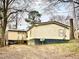 Single-wide manufactured home with yard at 2646 Lakeshore Ne Dr, Conyers, GA 30012