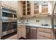 Bright kitchen features stainless steel appliances and light wood cabinets at 4370 Harris Trl, Atlanta, GA 30327