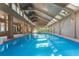 Inviting indoor pool with high ceilings and large windows at 4370 Harris Trl, Atlanta, GA 30327